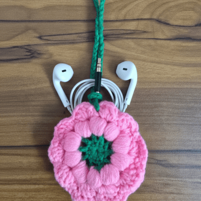 Crochet Flower Earphone Holder with Loop Strap – Pink & Green Yarn Case