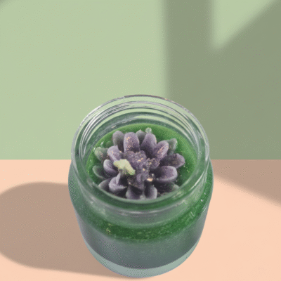 “Layered gel and wax scented candle in a clear glass jar with botanical decorative elements”