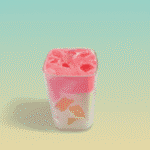 Layered dessert-style scented wax candle in a clear glass jar with pink top and caramel chunks