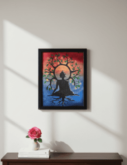 Framed meditation art showing a seated Buddha silhouette with a tree of life design, displayed on a minimalist wall with soft natural light.