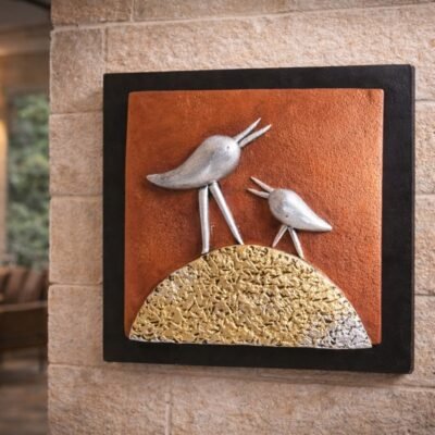 “Handmade terracotta bird wall art with textured base in contemporary folk design”