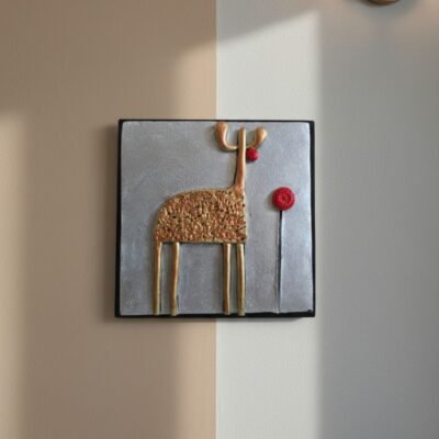 “Handmade terracotta animal wall art decorative piece in contemporary folk design”