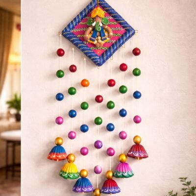 “Handmade terracotta Ganpati wall hanging with colorful beads and traditional Indian cultural design”