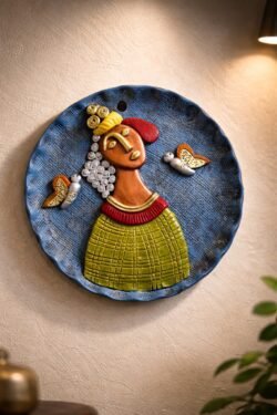 “Handmade terracotta tribal woman wall art decorative plate with butterfly motifs in contemporary folk style”