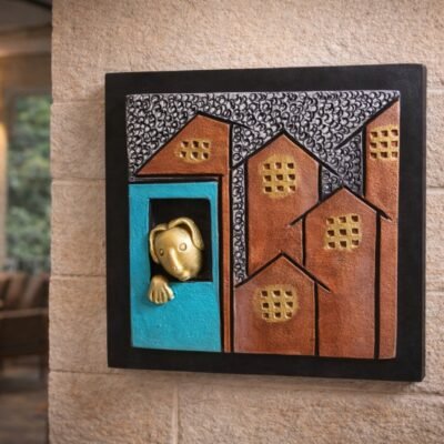 “Handmade terracotta wall art of a man looking out of a colorful window decorative piece”