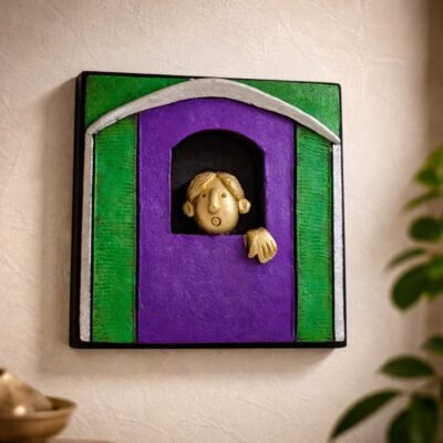 “Handmade terracotta wall art of a man looking out of a colorful window decorative piece”