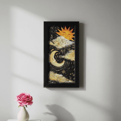 Framed celestial wall art featuring abstract sun and moon imagery, displayed on a minimalist wall above a wooden console with soft natural light.