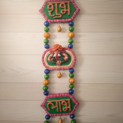 “Auspicious terracotta Shubh Labh wall hanging with Ganesha centerpiece and colorful beads”