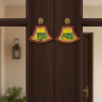 “Handcrafted Shubh Labh wall hanging with green, orange and gold detailing”