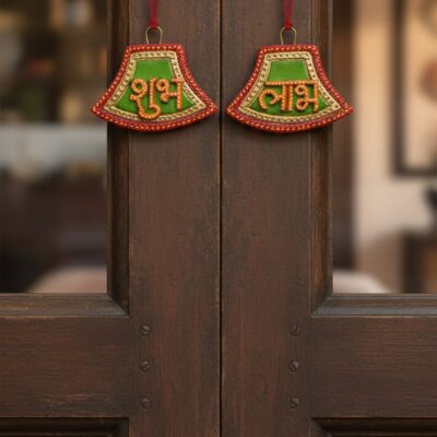 “Handcrafted Shubh Labh wall hanging with green, orange and gold detailing”