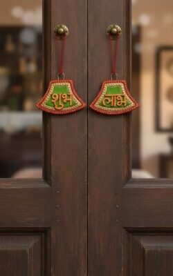 “Handcrafted Shubh Labh wall hanging with green, orange and gold detailing”