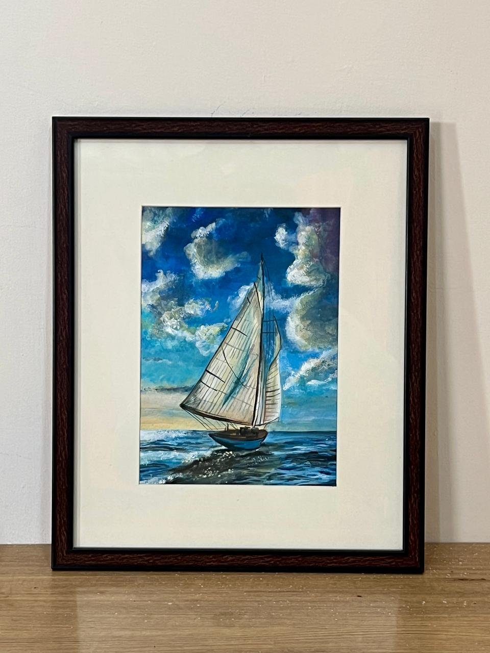 “Handmade blue sky sailing boat painting with ocean waves, watercolor and acrylic seascape wall art by Jeel”