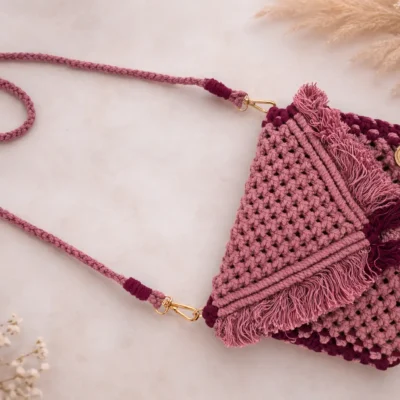Elegant handmade crochet sling bag in pink color with stylish macrame design. Lightweight, trendy and perfect for casual outings, travel and daily use. Unique handcrafted purse for women.