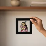 Handmade Radha glass painting in black frame with aesthetic traditional Indian art design