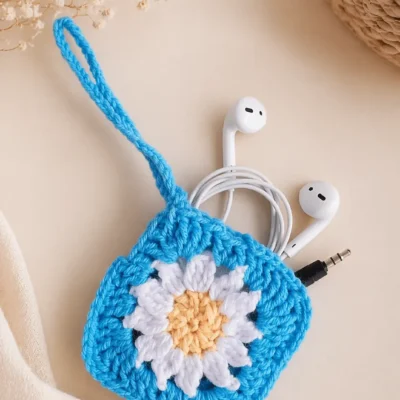Cozy minimalist flat lay with crochet pouch