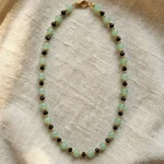 Handcrafted mint green bead necklace with sleek black crystal accents — perfect for effortless everyday luxury.
