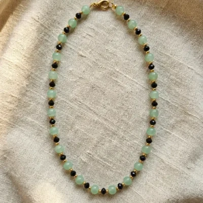 Handcrafted mint green bead necklace with sleek black crystal accents — perfect for effortless everyday luxury.
