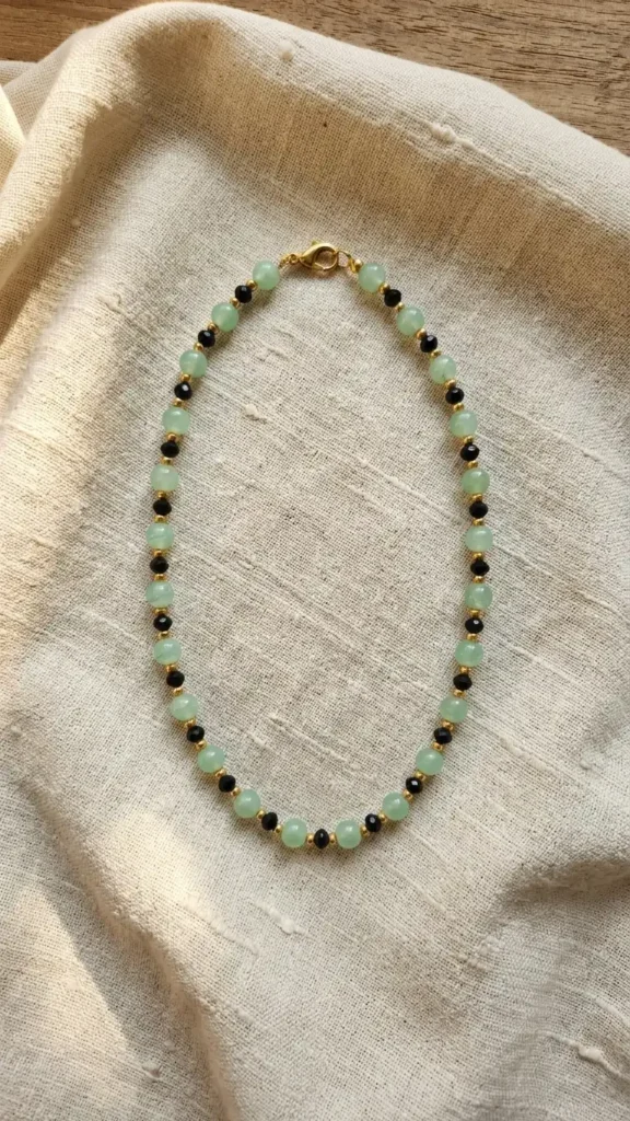 Handcrafted mint green bead necklace with sleek black crystal accents — perfect for effortless everyday luxury.