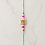 Designer Rakhi with Gold Leaf Charm, Pearl & Pink Beads Premium Raksha Bandhan Rakhi for Brother