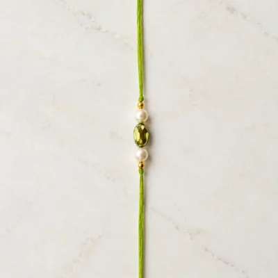 Handmade Pearl and Crystal Bead Rakhi for Brother