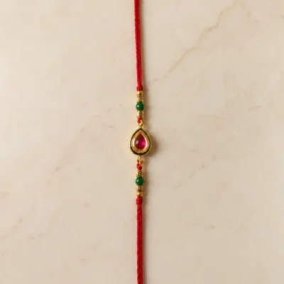 Teardrop Pink Stone Designer Rakhi with Green Beads & Red Silk Thread Premium Raksha Bandhan Rakhi